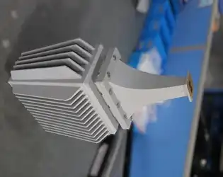 How Does a Double Ridge Waveguide Load Help in Minimizing Reflection and Improving Power Absorption?